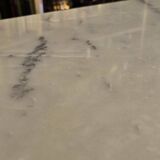 Oval bistro table - marble and cast iron