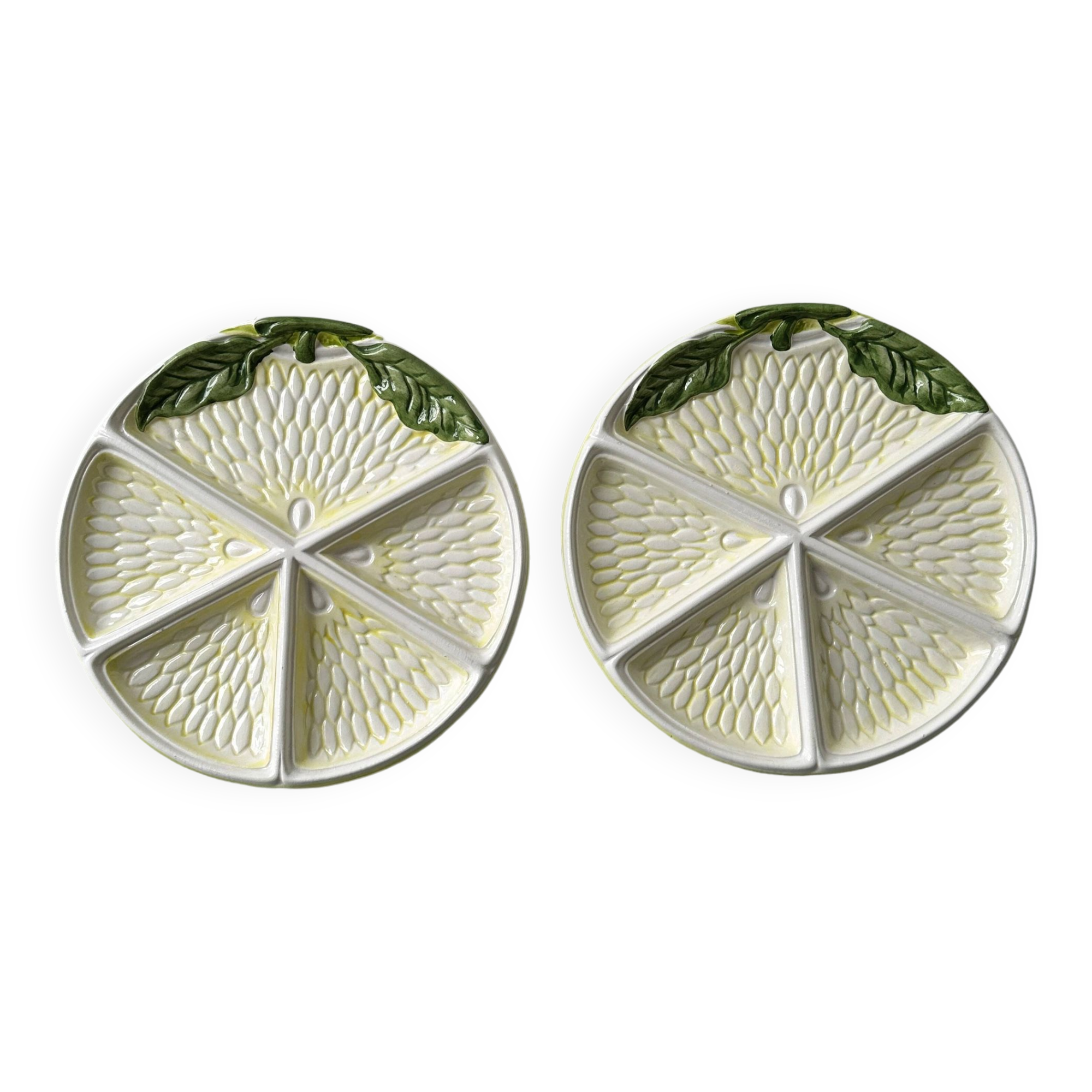 2 ceramic plates depicting a lemon
