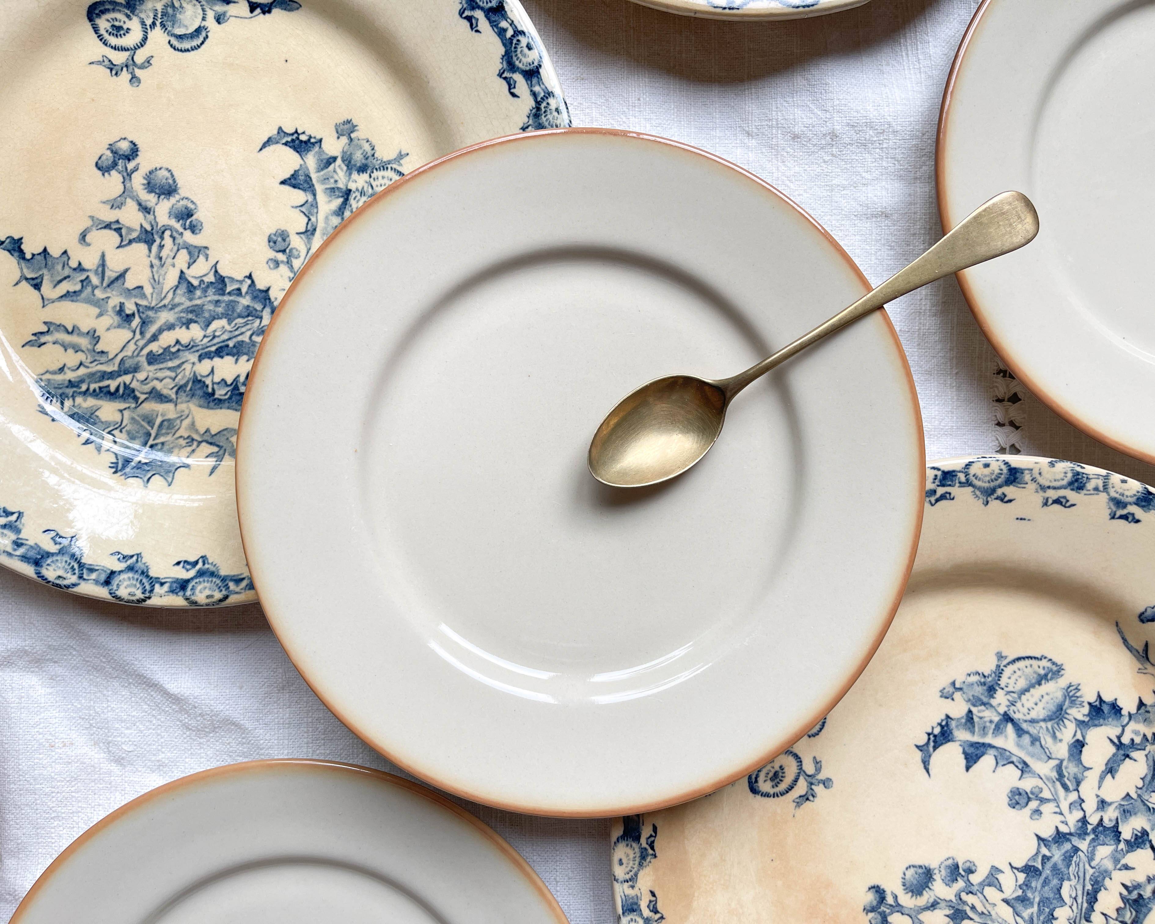 4 Gien Thistle ironstone plates + 4 small mismatched Tulowice stoneware plates