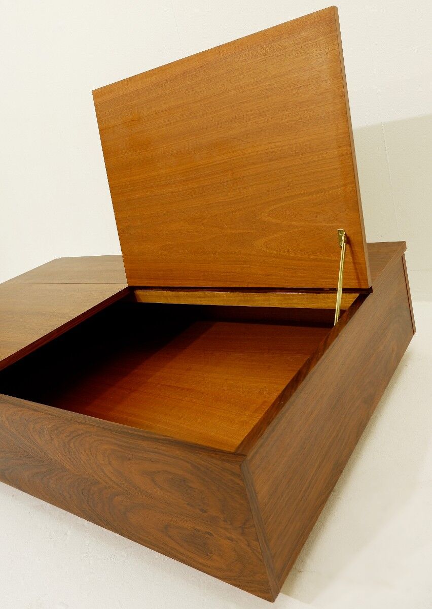 Coffee table with two opening compartments