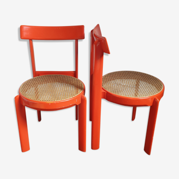 Pair of orange lacquered chairs and vintage cannage