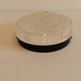 Ceiling light, in dark metallic paint with thick glass shade with beautiful details in the glass.