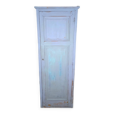 Rustic antique bonnetière in weathered blue-grey wood.