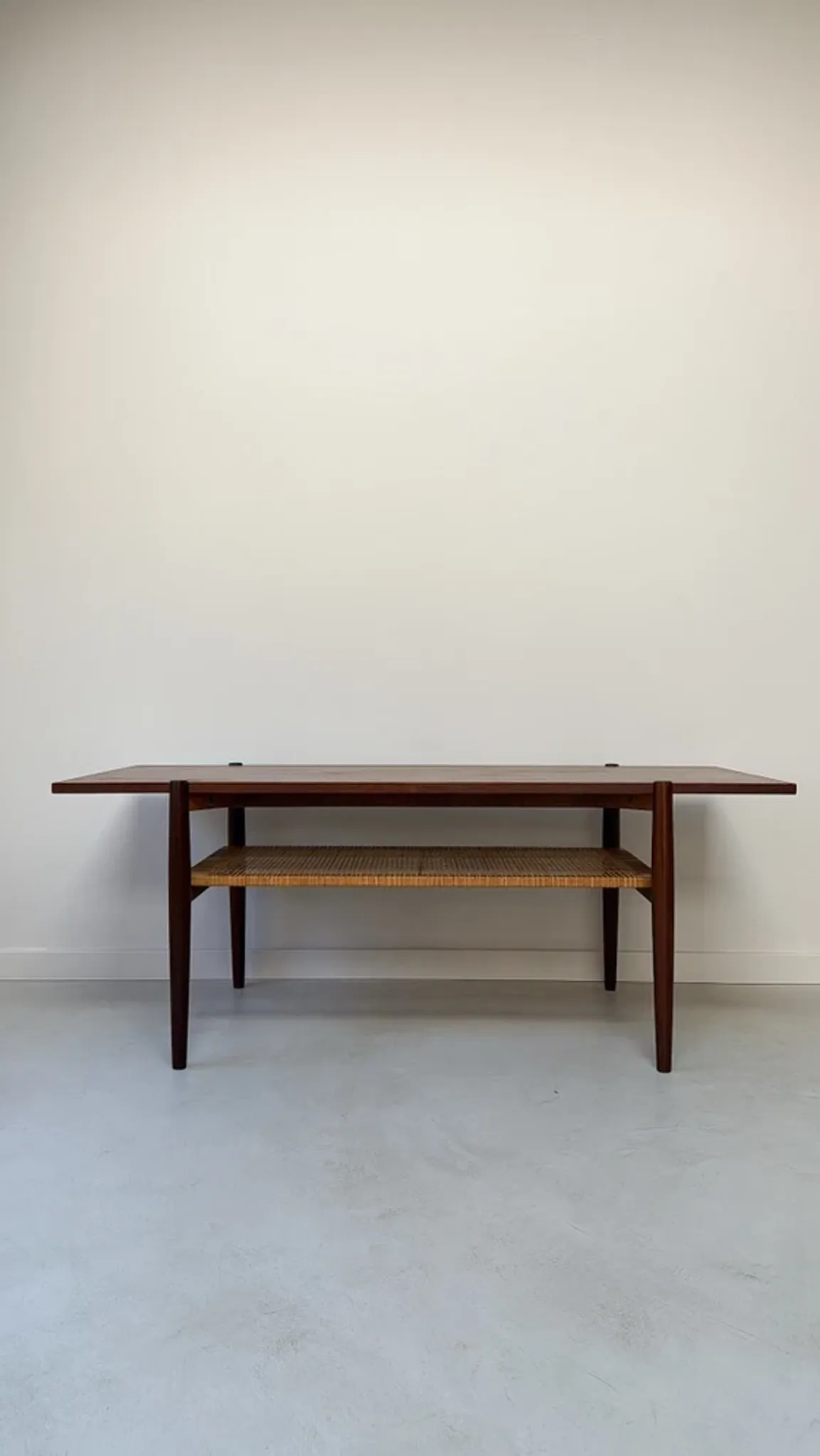 Vintage wooden coffee table with wicker lower shelf