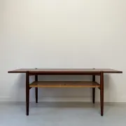 Vintage wooden coffee table with wicker lower shelf