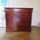 Commode 4 tiroirs – Teinte merisier – Imitation Style Empire – Années 80