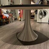 Round black top table with metal legs KARE design