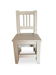 Small children's chair in antique white wood.