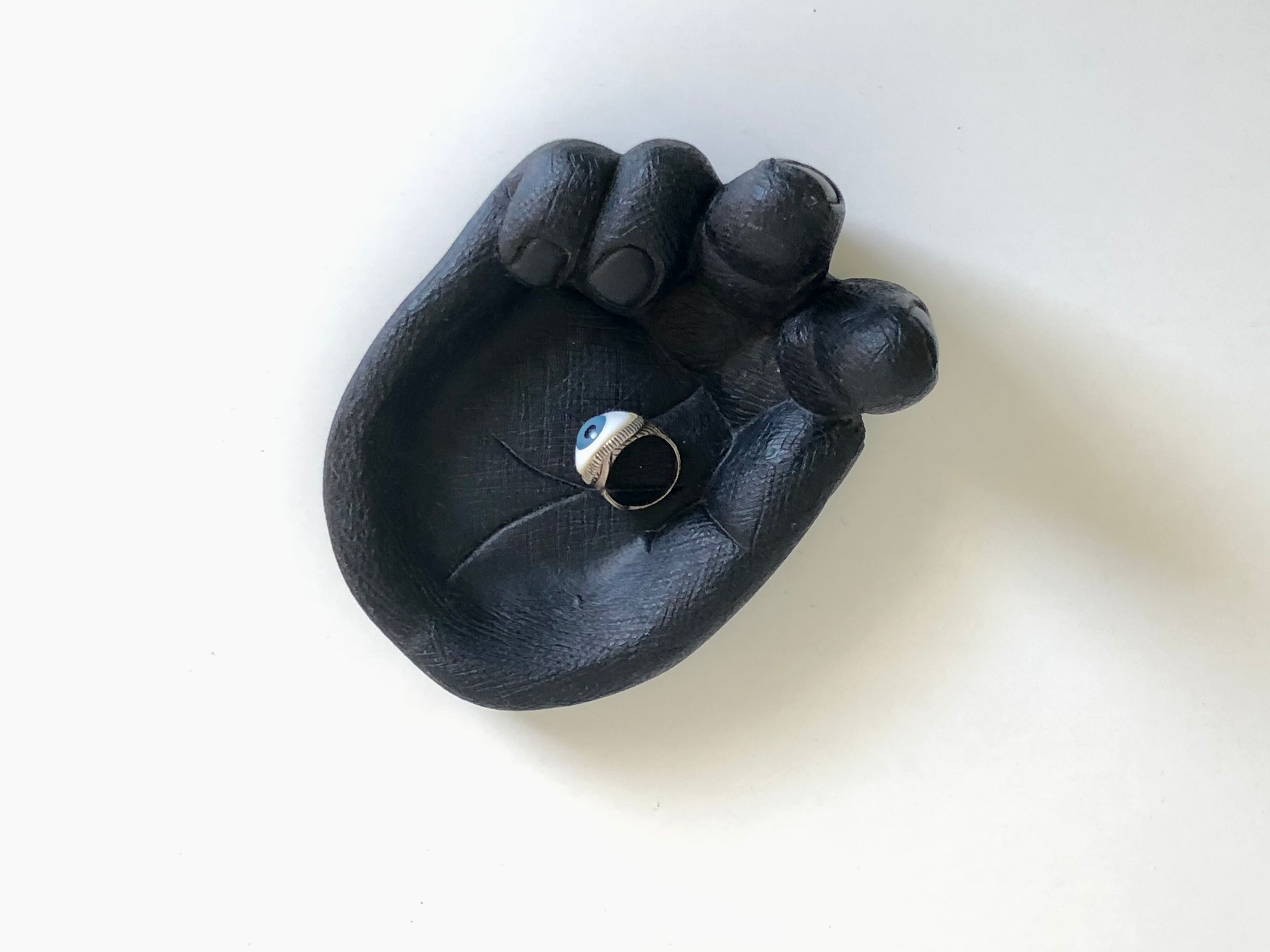 Empty pocket in Hawaiian lava in the shape of a hand signed Coco Joe, 1960