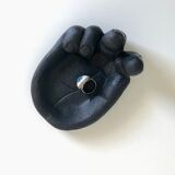Empty pocket in Hawaiian lava in the shape of a hand signed Coco Joe, 1960