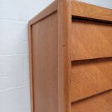 High wooden chest of drawers in the 50s
