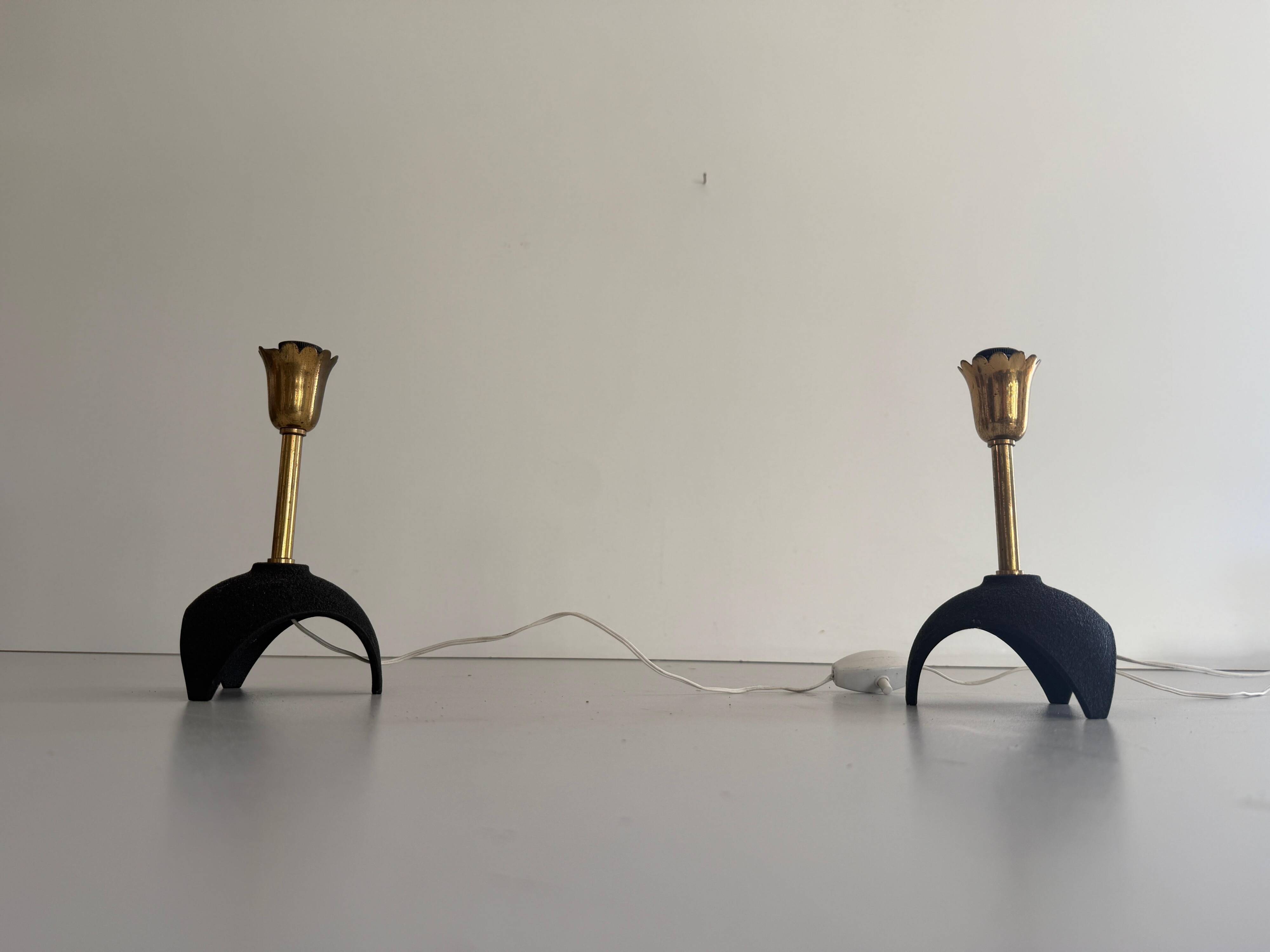 Pair of mid-century bedside lamps in brass and black metal, 1960, Italy