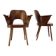 Pair of curved wooden shell armchairs in the style of Oswald Haerdtl.