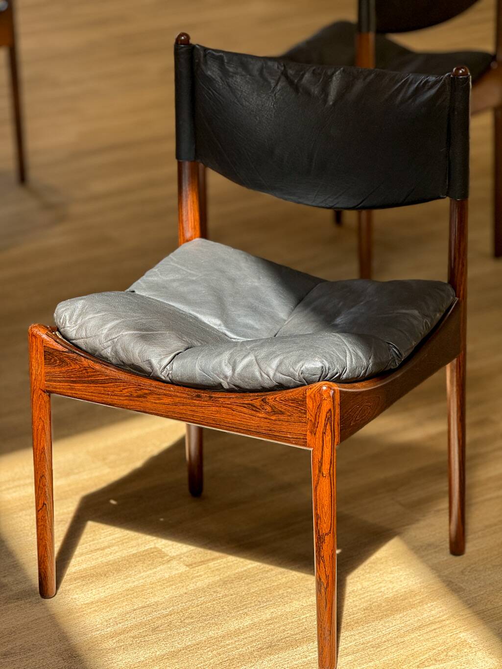 Extendable dining room table and chairs (by Kristian Solmer Vedel)