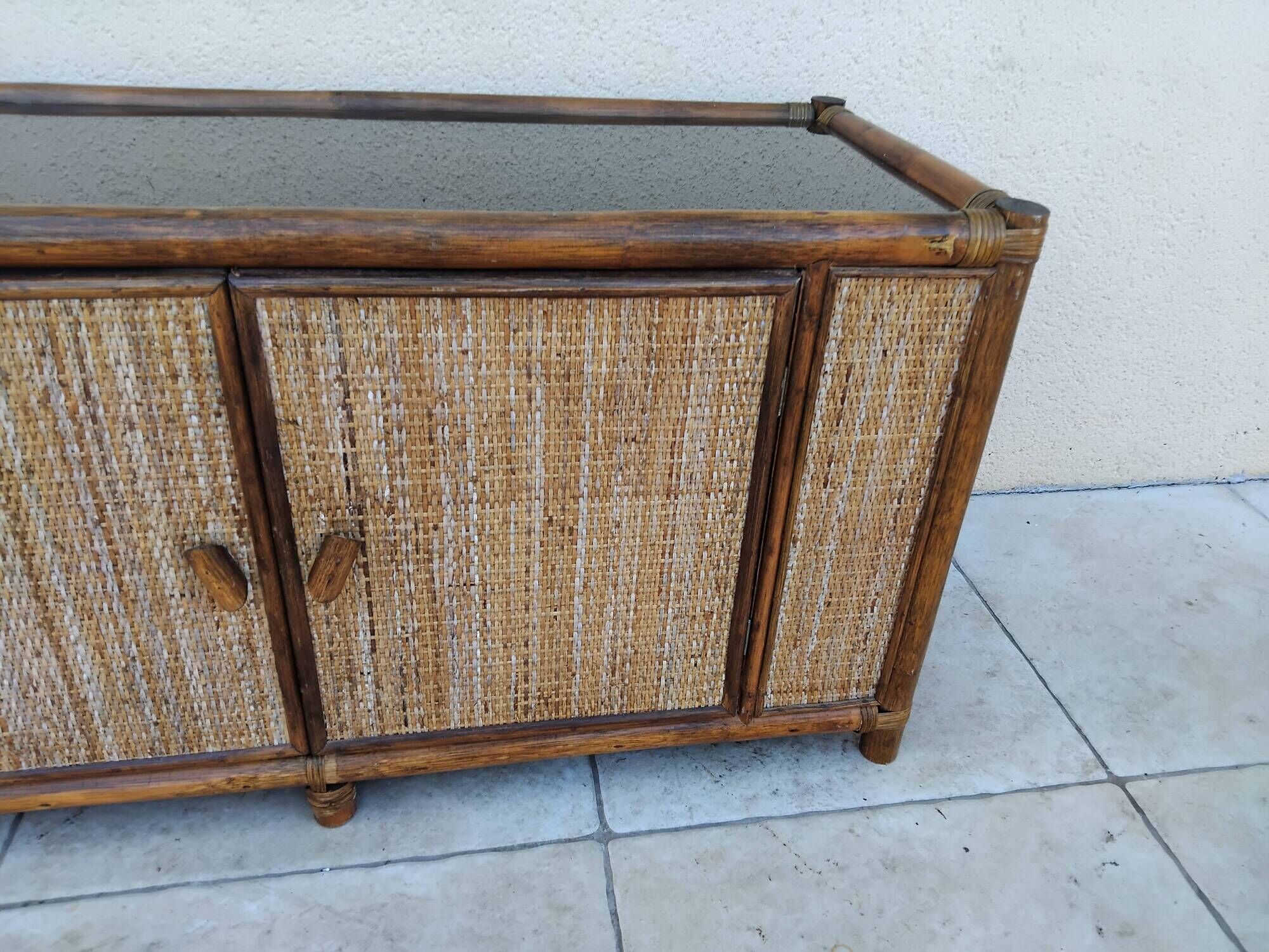 Vintage sideboard TV unit in rattan, bamboo and glass.