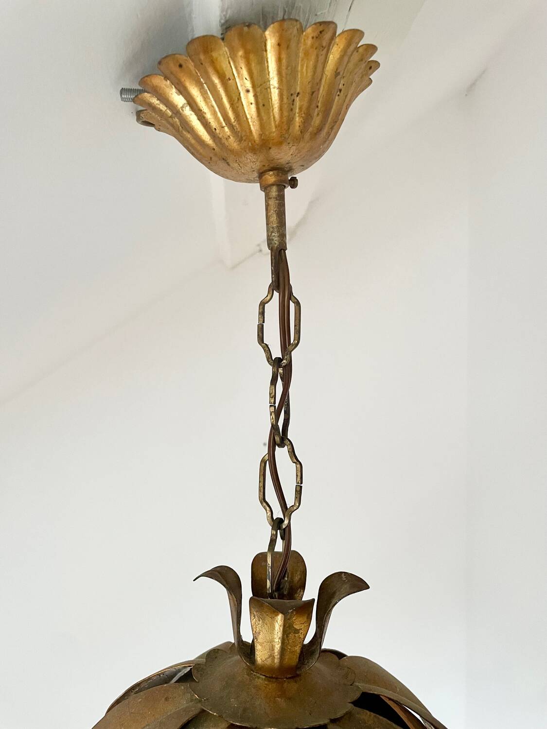Two vintage pendant lights in gold metal