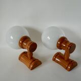 Pair of globe wall lights in pine and opaline from the 60s