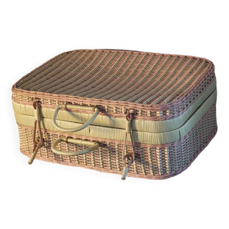 Pink rattan suitcase