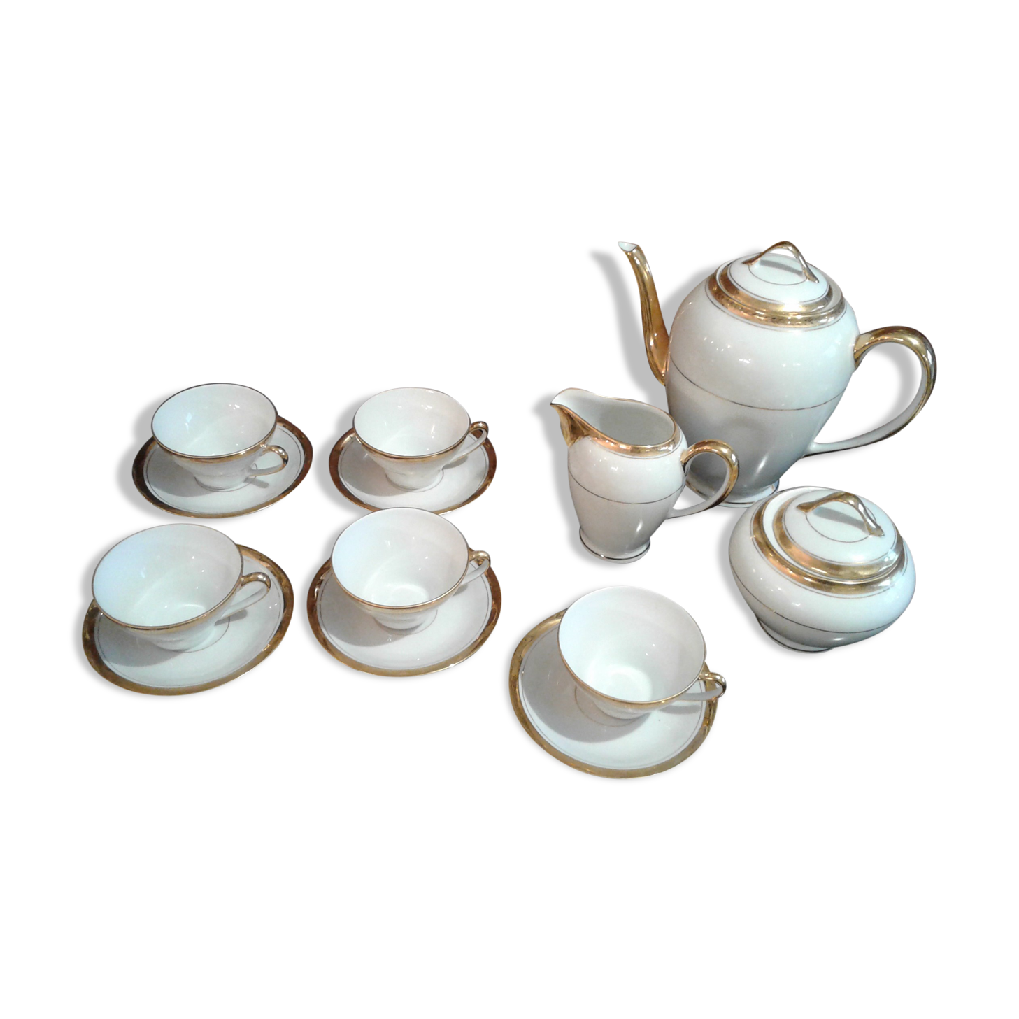 Coffee service. fine porcelain from Limoges. golden