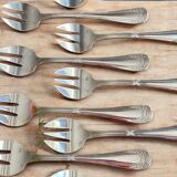12 oyster forks with crossed ribbons in silver metal