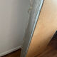 Large antique baroque mirror with angel decorations.