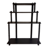 Napoleon III wall shelf made of turned wood painted black.