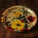 Round plastic top vintage flowers