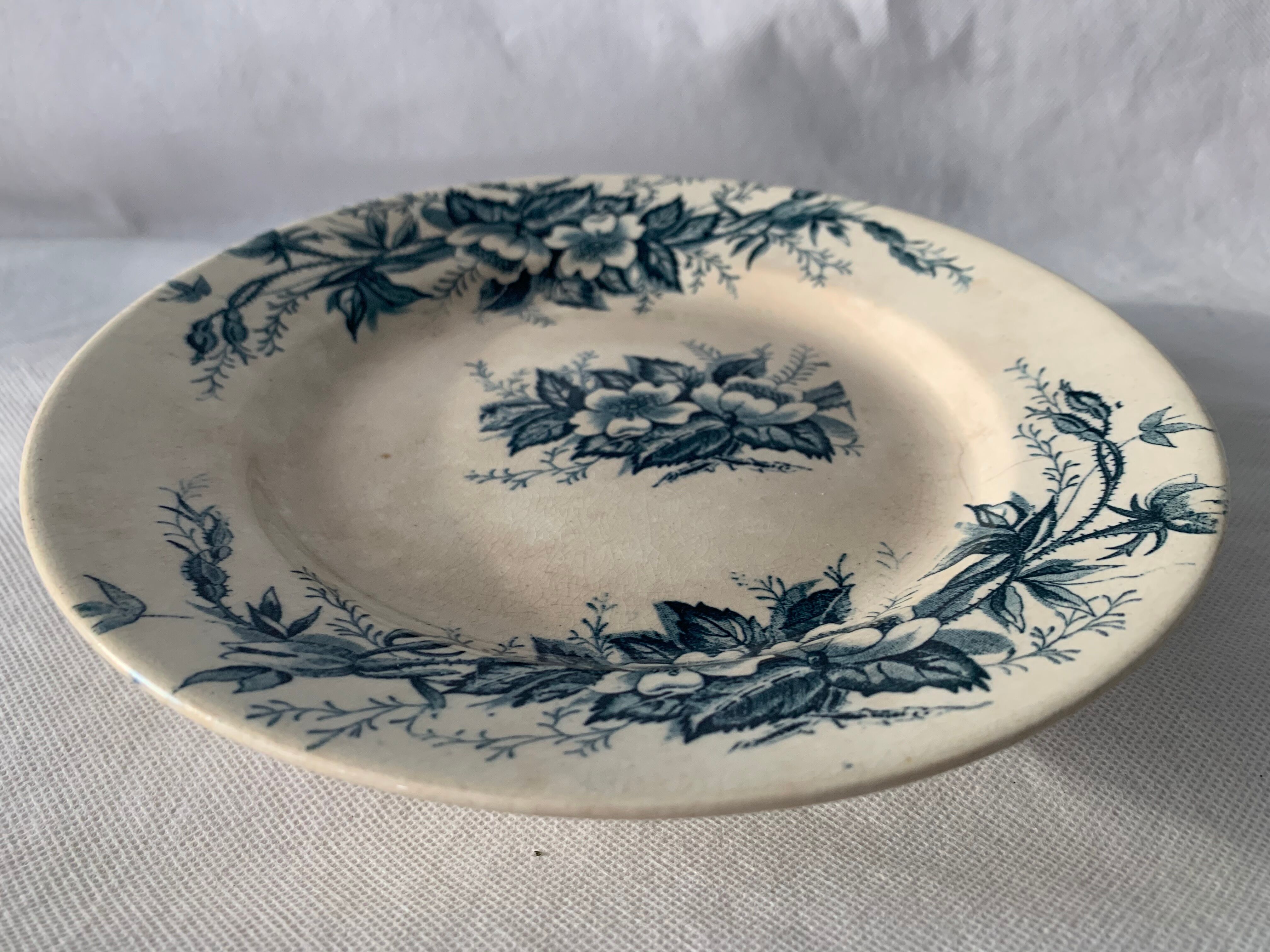 8 plates and an old compoter Terre de Fer HB and Co.