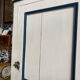 Antique bonnetière in cream and blue painted wood – in its original condition.