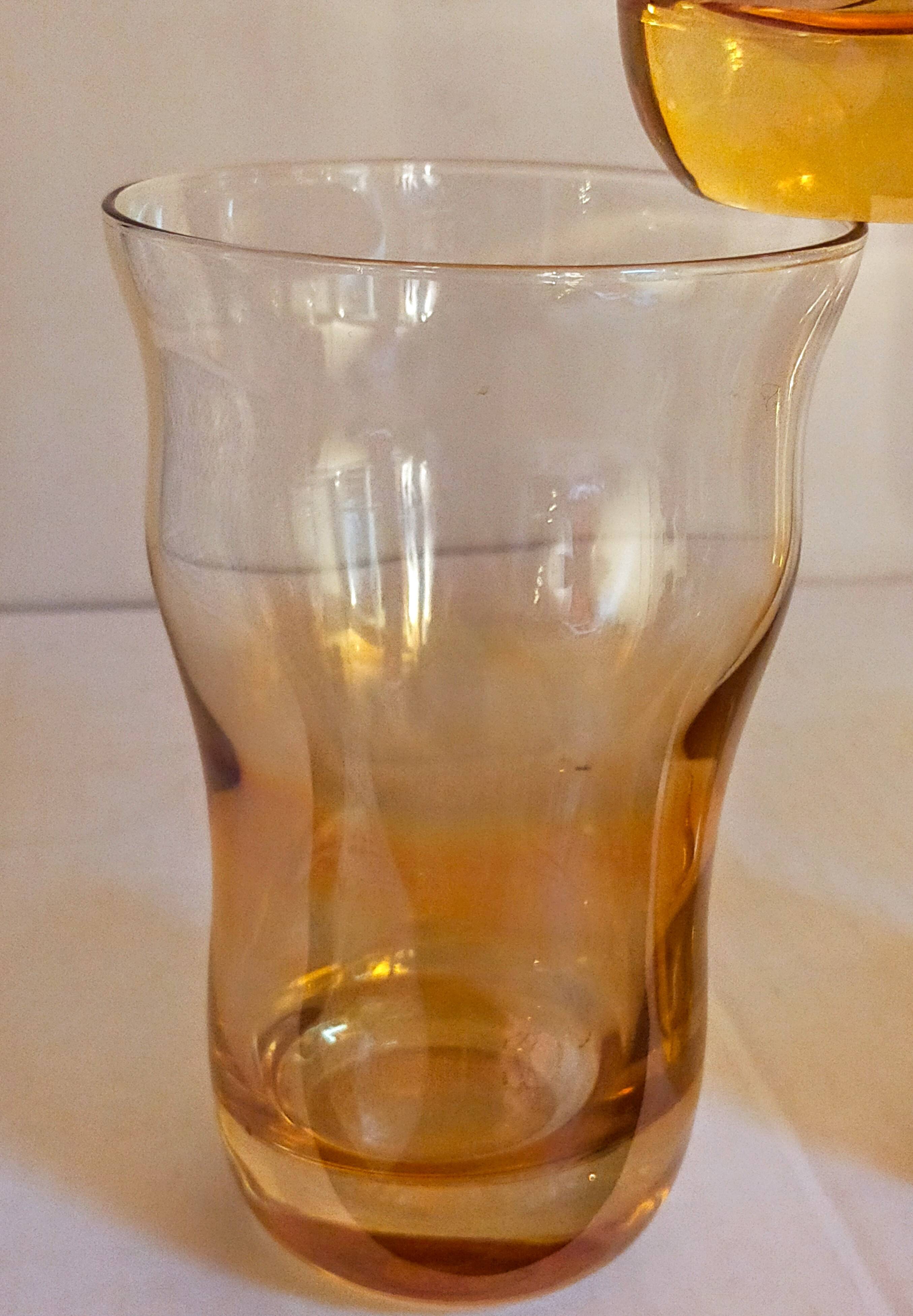 Four iridescent honey blown glass glasses