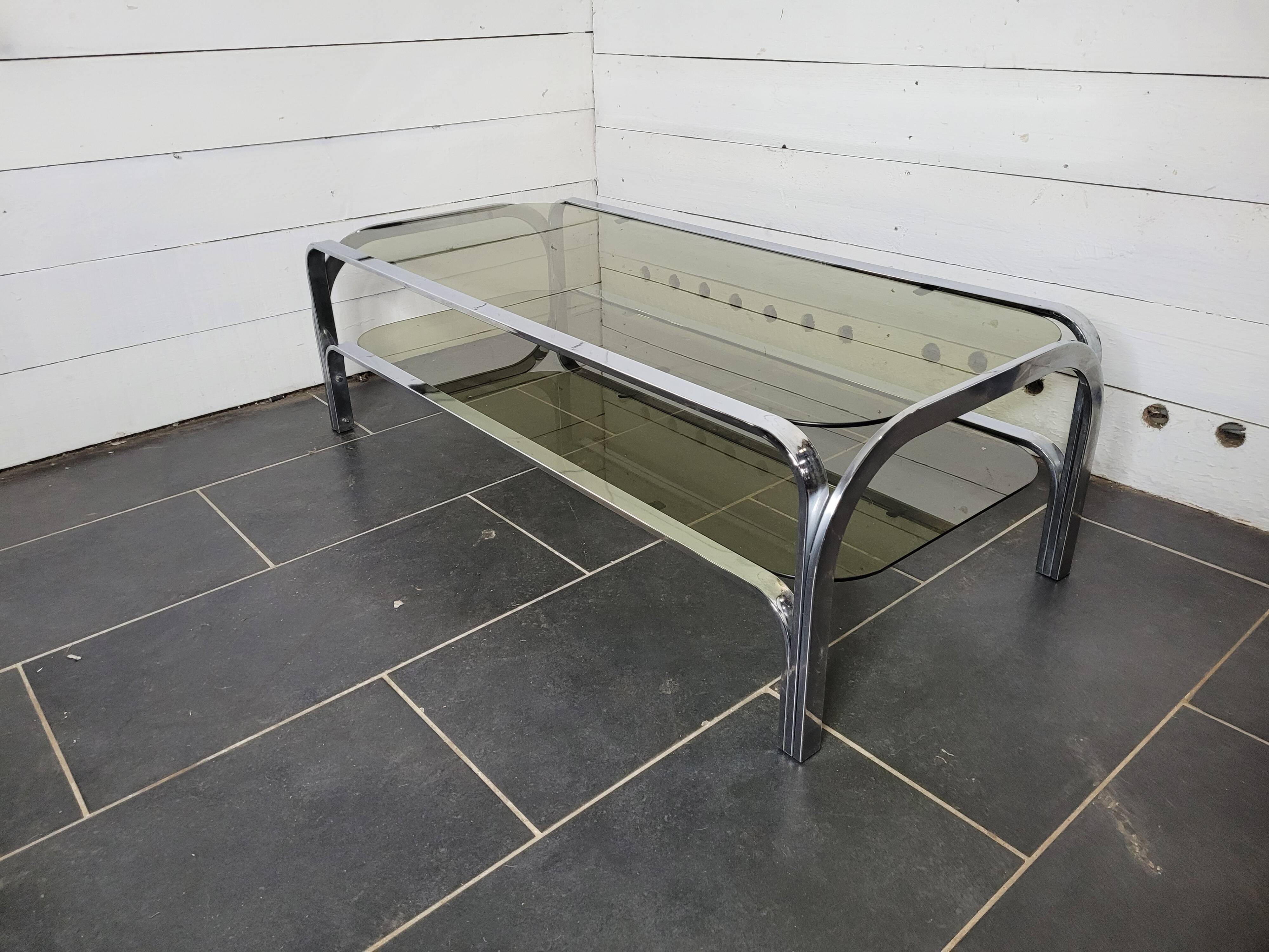 Chromed metal coffee table with smoked glass top from the 70s