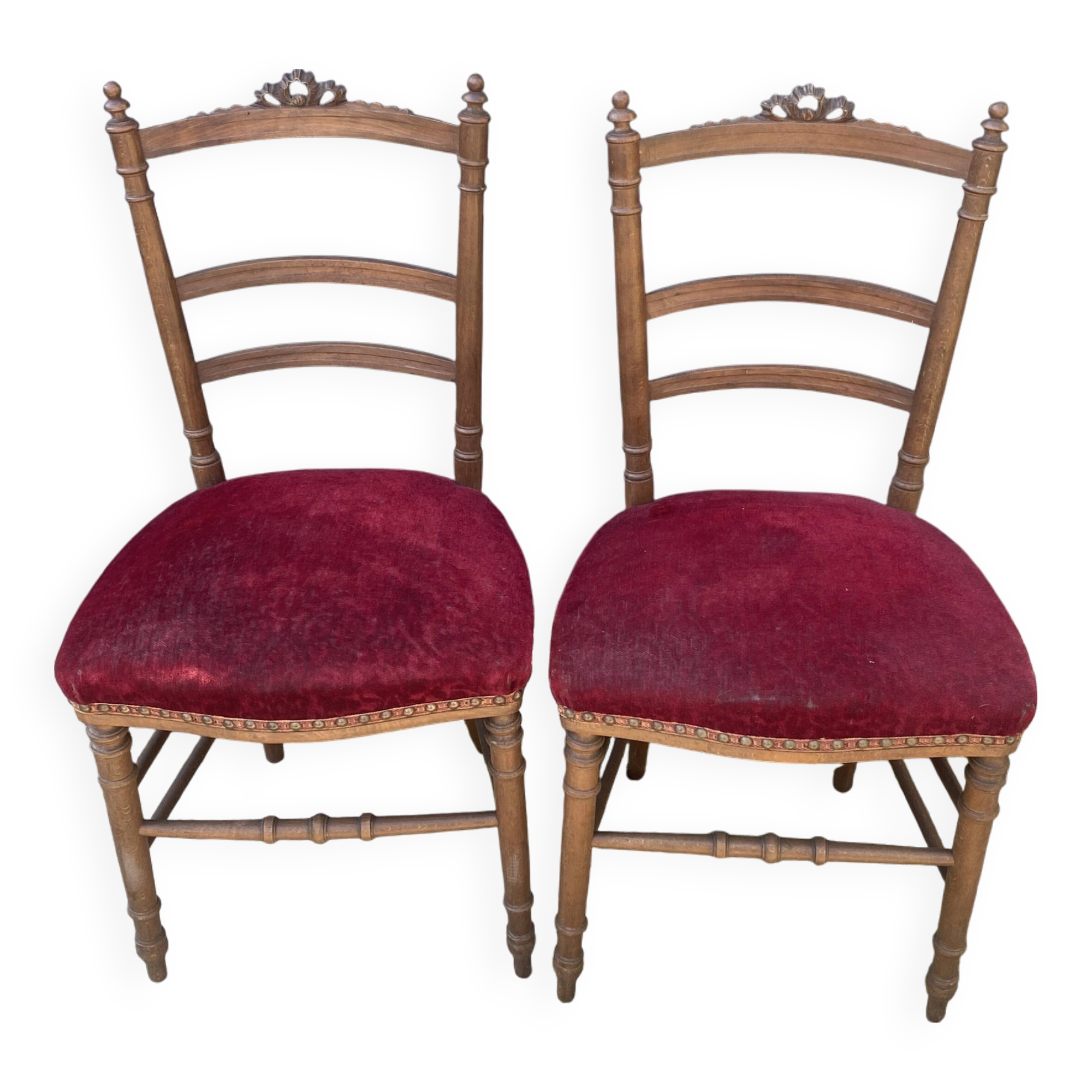 2 red velvet chairs