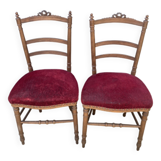 2 red velvet chairs