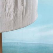 Vintage Swedish wooden floor lamp with pleated shade from the 1960s.