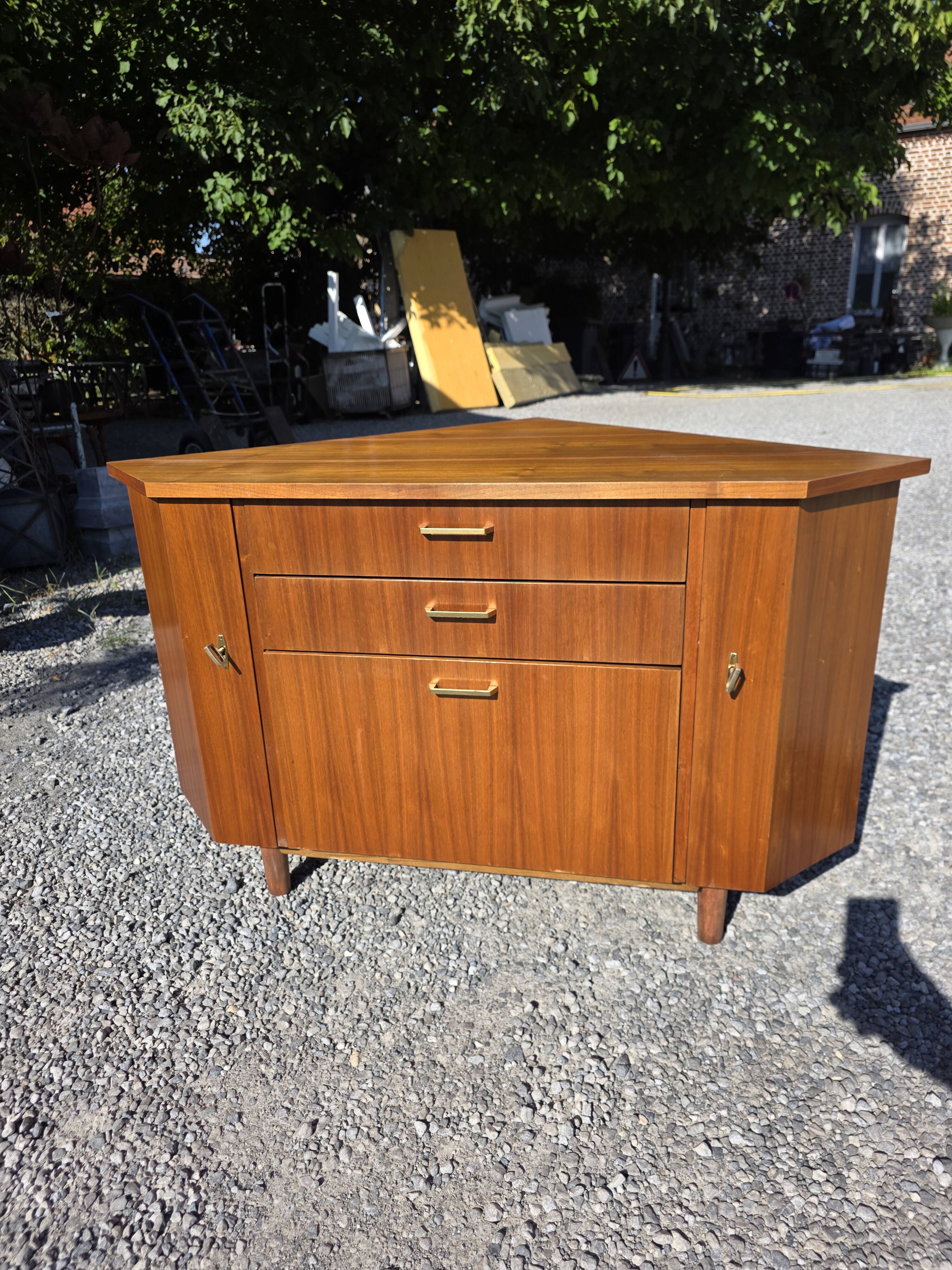 Scandinavian corner unit in teak from the 1960s.
