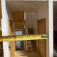 Large wooden dollhouse with miniature furniture
