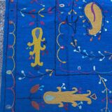 Midnight blue suzani kilim rug with embroidered patterns