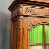 Liège bookcase in carved oak Regency style
