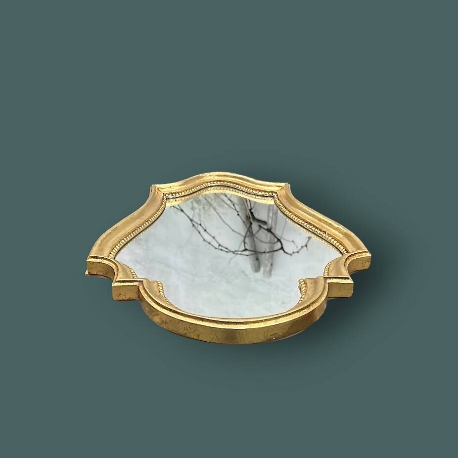 Antique mirror in gilded resin, shaped with curves – neoclassical style
