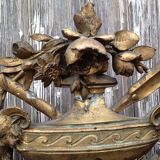 Wooden fireplace mirror and Gilded Louis XVI-style plaster with leaf