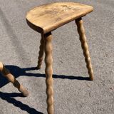 Pair of tripod farm stools in turned wood