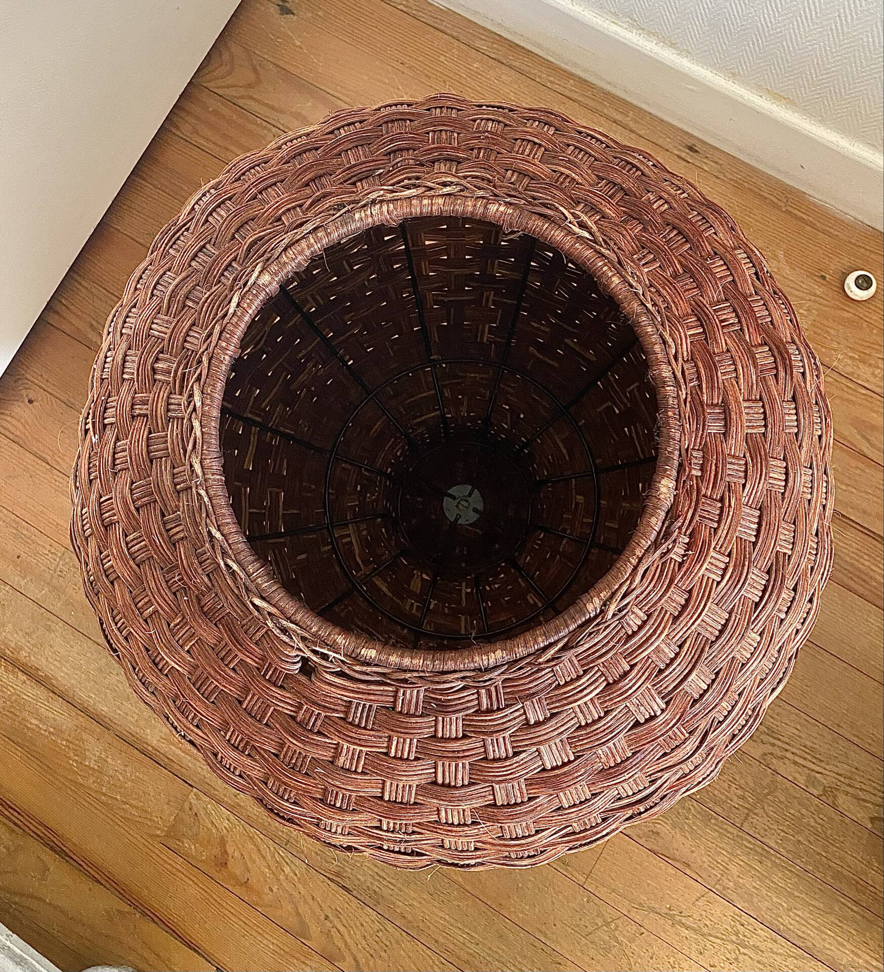 Large vintage lampshade made of hand-woven rattan.