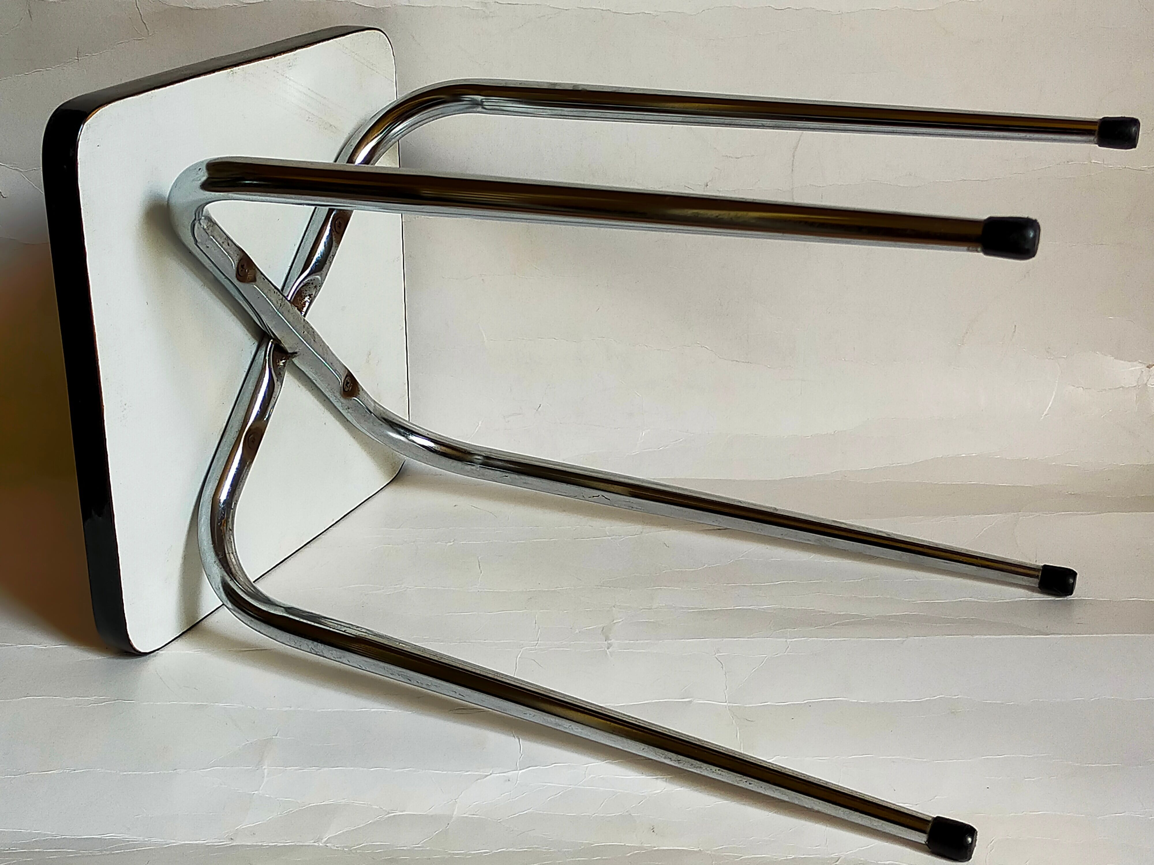 Vintage formica stool with tapered feet