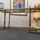 Vintage brass and smoked glass console.