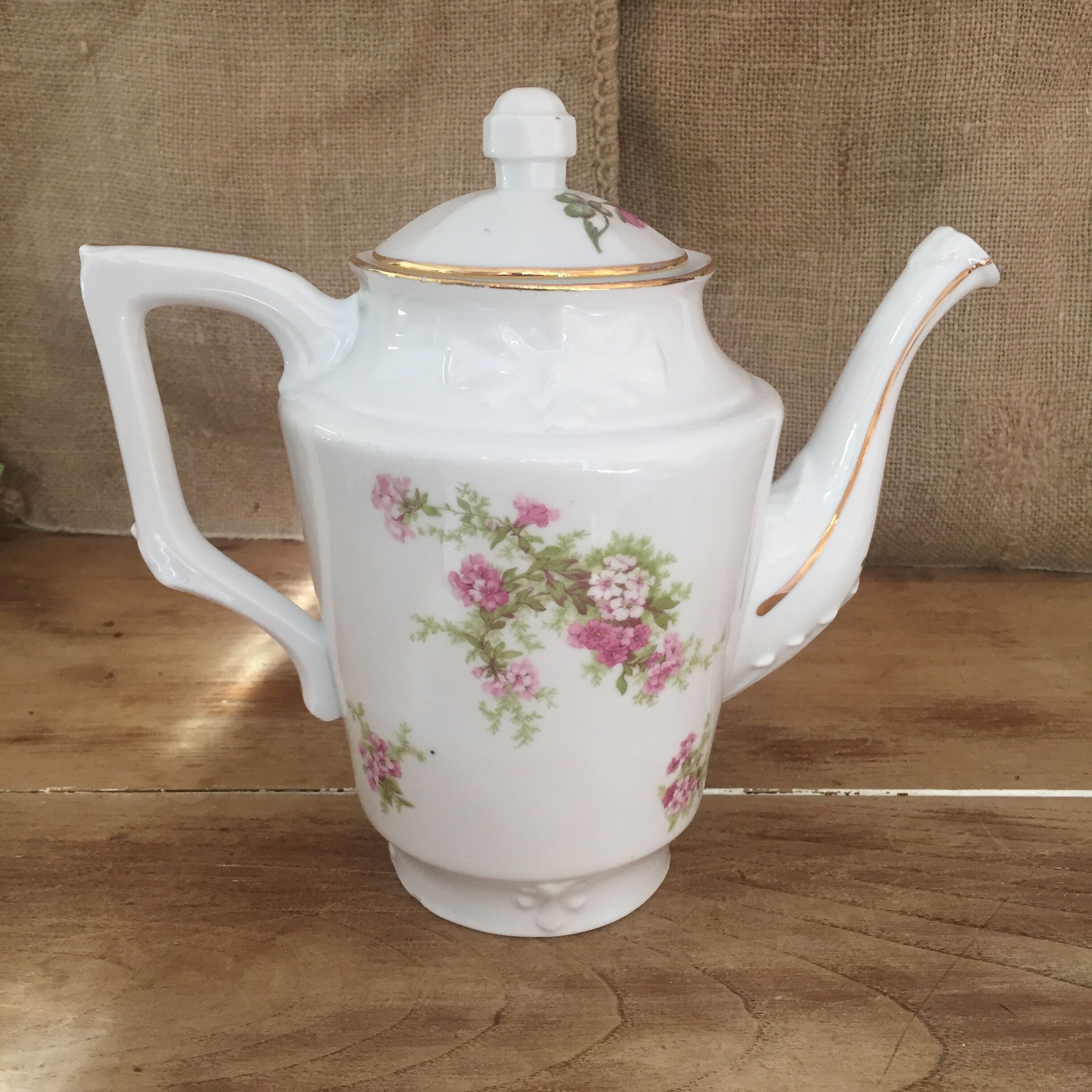 Old porcelain tea and coffee maker