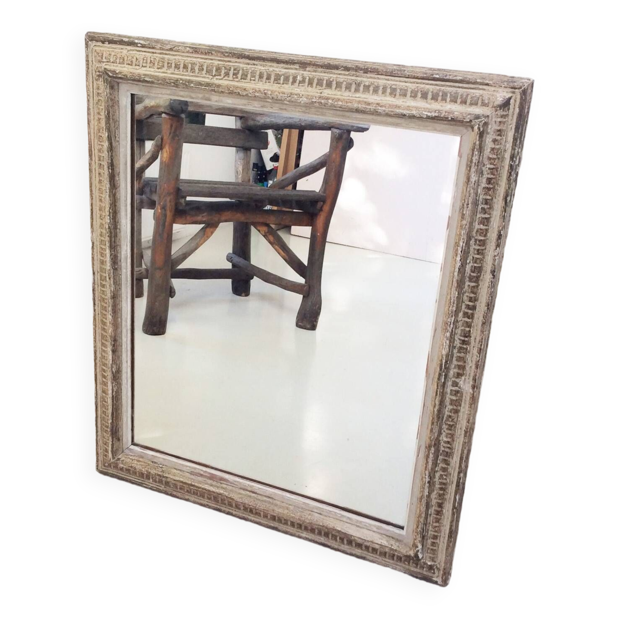 Antique mirror with Montparnasse frame channels