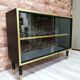 Display case, 1970s Poland, renovated. Black and gold.