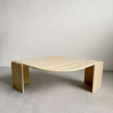 Teardrop travertine coffee table
