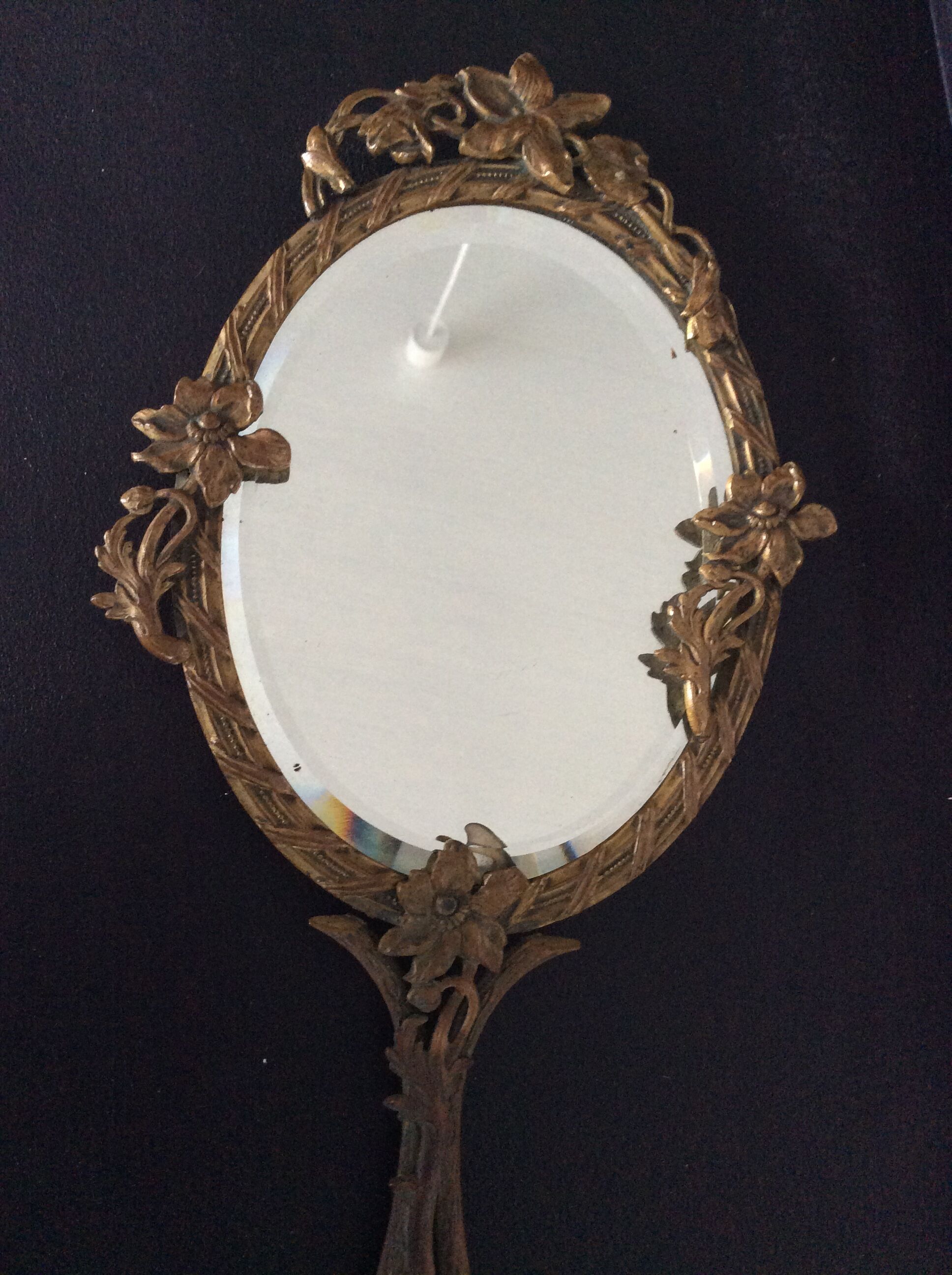 Art Deco hand-facing mirror in bronze and beveled ice