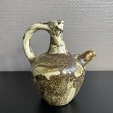 Ceramic pitcher signed Pegomas